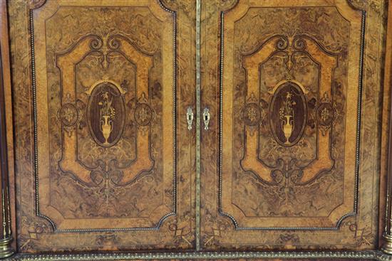 A Victorian ormolu mounted marquetry and walnut side cabinet, W.6ft 9in. D.1ft 8in. H.3ft 7in.